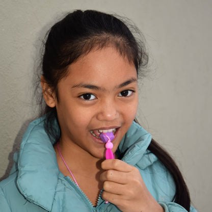 Munchables Chewelry Zipper Pull Attached to Jacket Worn by Girl in Washington, United States