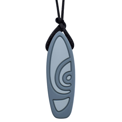 Munchables Surfboard Chew Necklace in two shades of gray strung on a black cord.