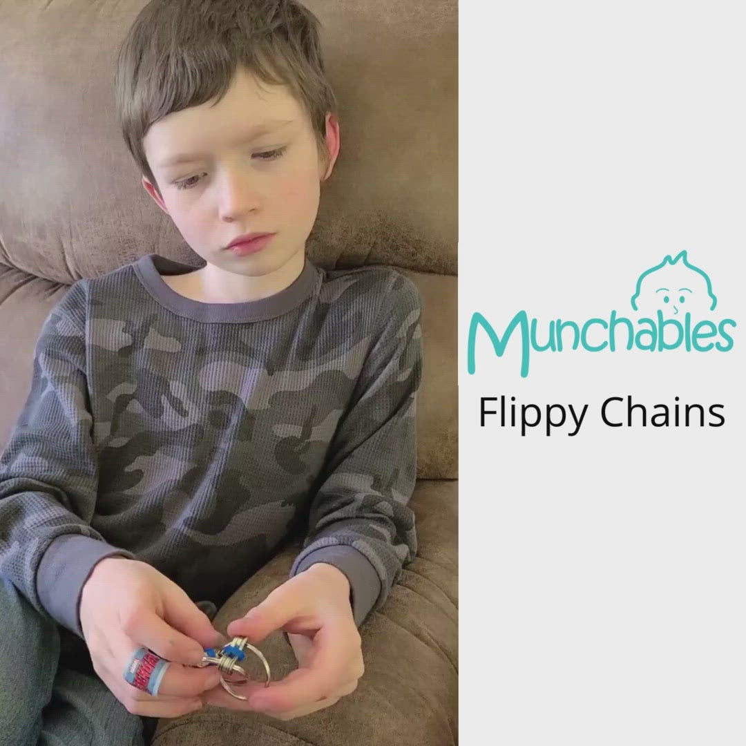 Video of boy playing with blue flippy chain fidget toy.